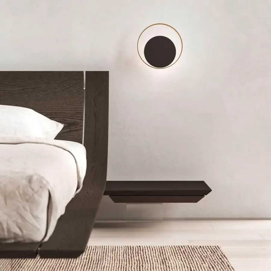 Distinguished Presotto Aqua bed with curved dark oak veneer, white linens and floating Canaletto walnut nightstand built in Italy