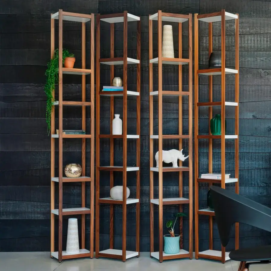 Distinguished Horm Singles bookcase in solid walnut with evenly spaced lacquered MDF shelves exhibiting visual lightness