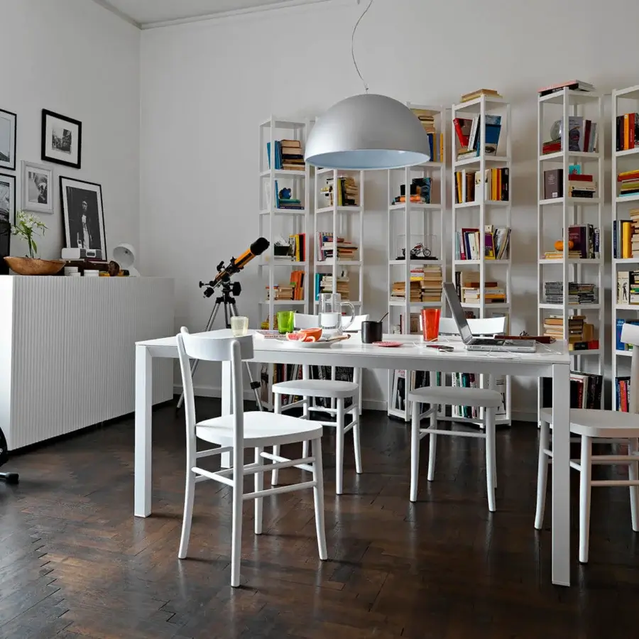 Superior Horm Singles bookcase presents a tall geometric form with fixed lacquered MDF shelves and a matte finish