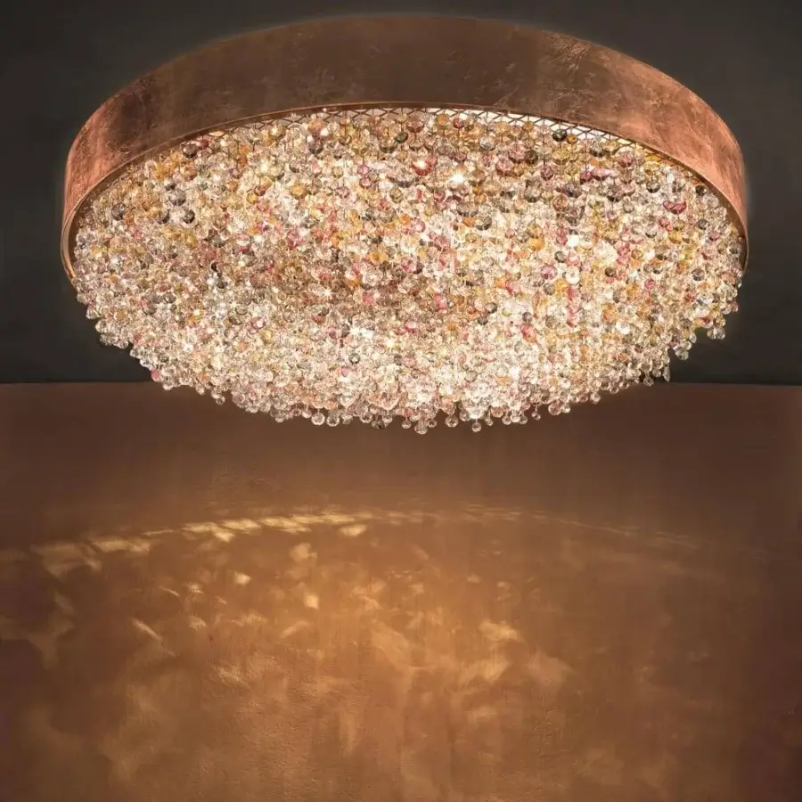 Elegant Masiero Olà ceiling lamp with burnished metal frame and cluster of amber-colored coated Italian glass pendants