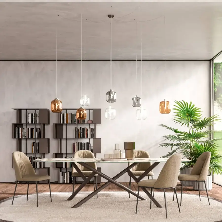 Distinguished Ozzio Italia Botticelle suspension lamp with a round metal body and clear blown glass diffuser in copper and silver tones