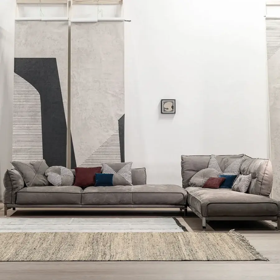 Superior Cierre1972 Up-Down sectional in matte gray textile with plush cushions and thin metal legs