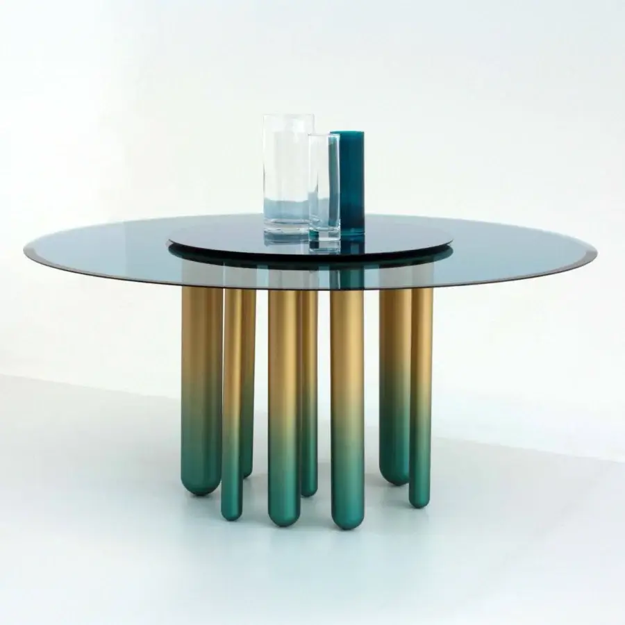 Distinguished Casa Casati Discoteca table with refined blue glass top and turquoise gold brass legs in glossy finish