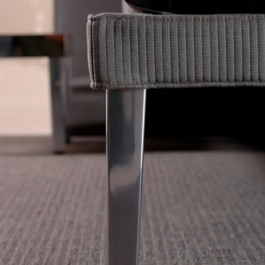 Exclusive Horm Ebridi bed with ribbed matte gray textile upholstery and glossy metal square leg