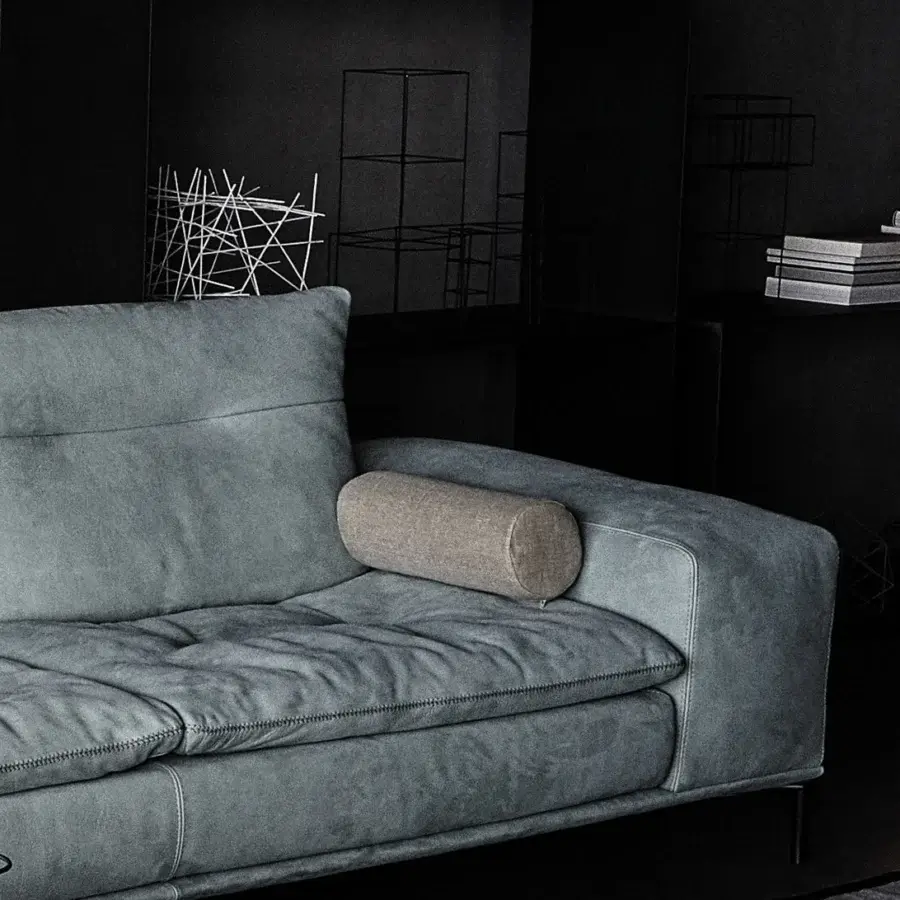 Distinguished Cierre1972 Carlton sofa with geometric form and muted gray-blue textile upholstery exhibiting a matte finish