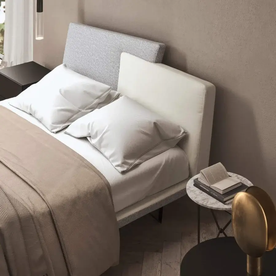 Innovative Presotto Meeting bed with a deconstructed headboard upholstered in light grey speckled and solid textiles