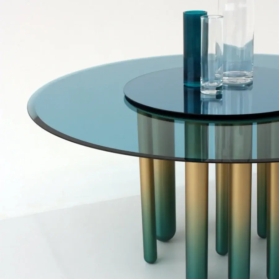 Lavish Casa Casati Discoteca table with refined blue glass top, mirrored Lazy Susan and turquoise gold brass legs