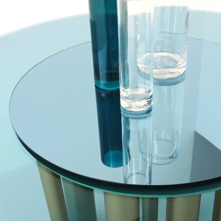 Superior Casa Casati Discoteca table with blue glass top, turquoise and gold finished irregularly spaced brass legs, built with mirrored Lazy Susan
