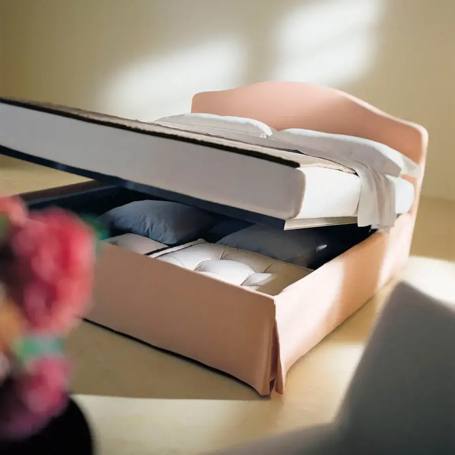 Distinguished Horm Elba Plus bed in light peach textile with solid beechwood feet and mocha lacquer finish