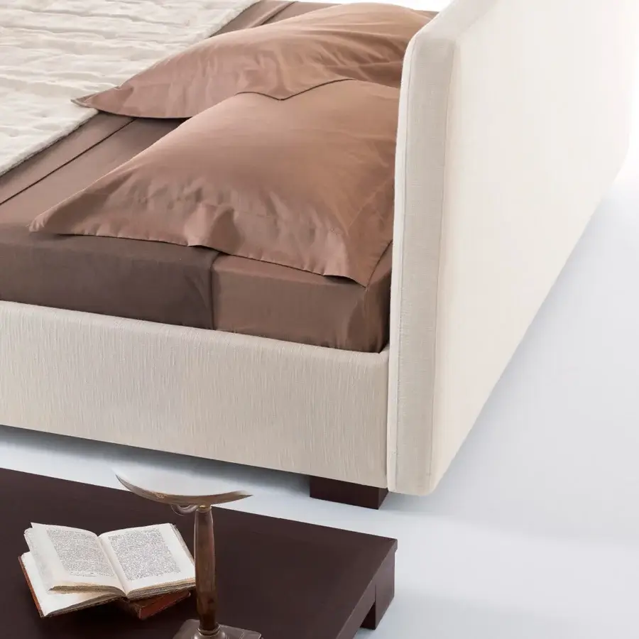 Distinguished Horm Lipari bed with woven light beige upholstery and low rectangular solid beechwood legs in mocha lacquer