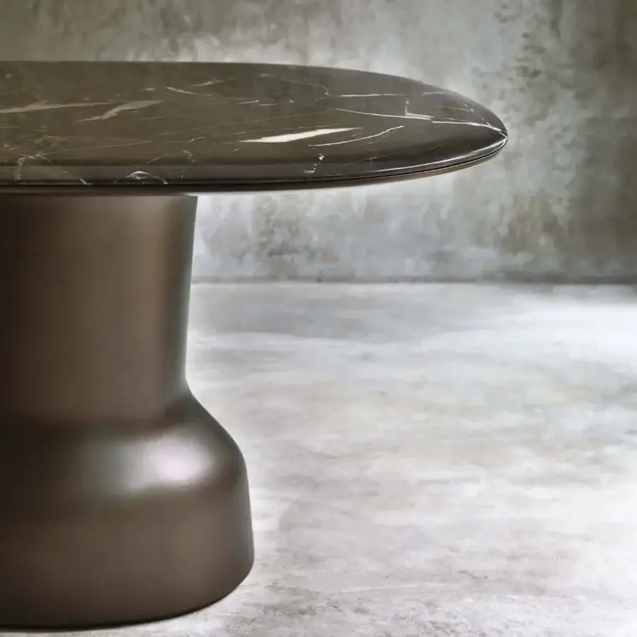 Exceptional Casa Casati Musa table with a dark gray and brown marble top and matte bronze resin pedestal base