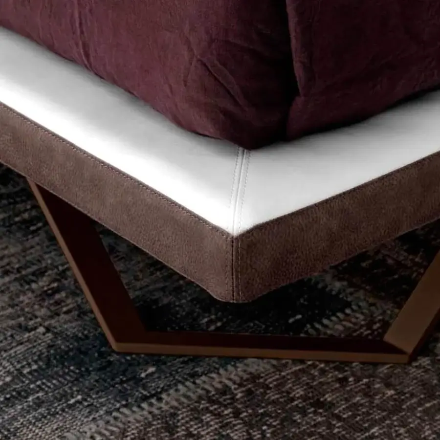 Distinguished Presotto Meeting bed with white upholstery, a brown frame and matte brown metal base creating a geometric silhouette