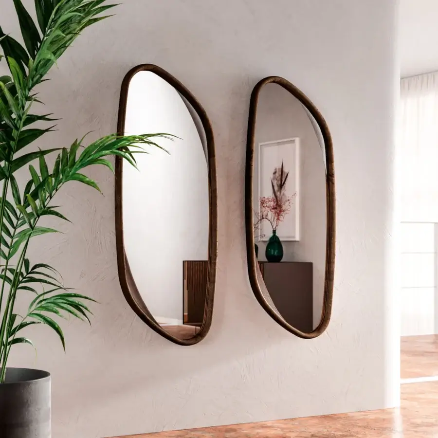 Elegant Ozzio Italia Monza mirror with oval shape and warm medium brown textured wooden frame