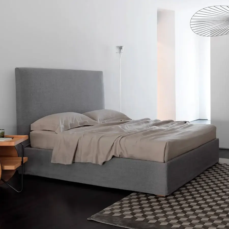 Exceptional Horm Panarea bed with soft gray textile upholstery and mocha lacquered solid beechwood feet