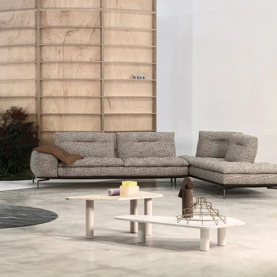 Distinctive Cierre1972 Carlton sectional with textured beige-gray textile upholstery and slim metal base