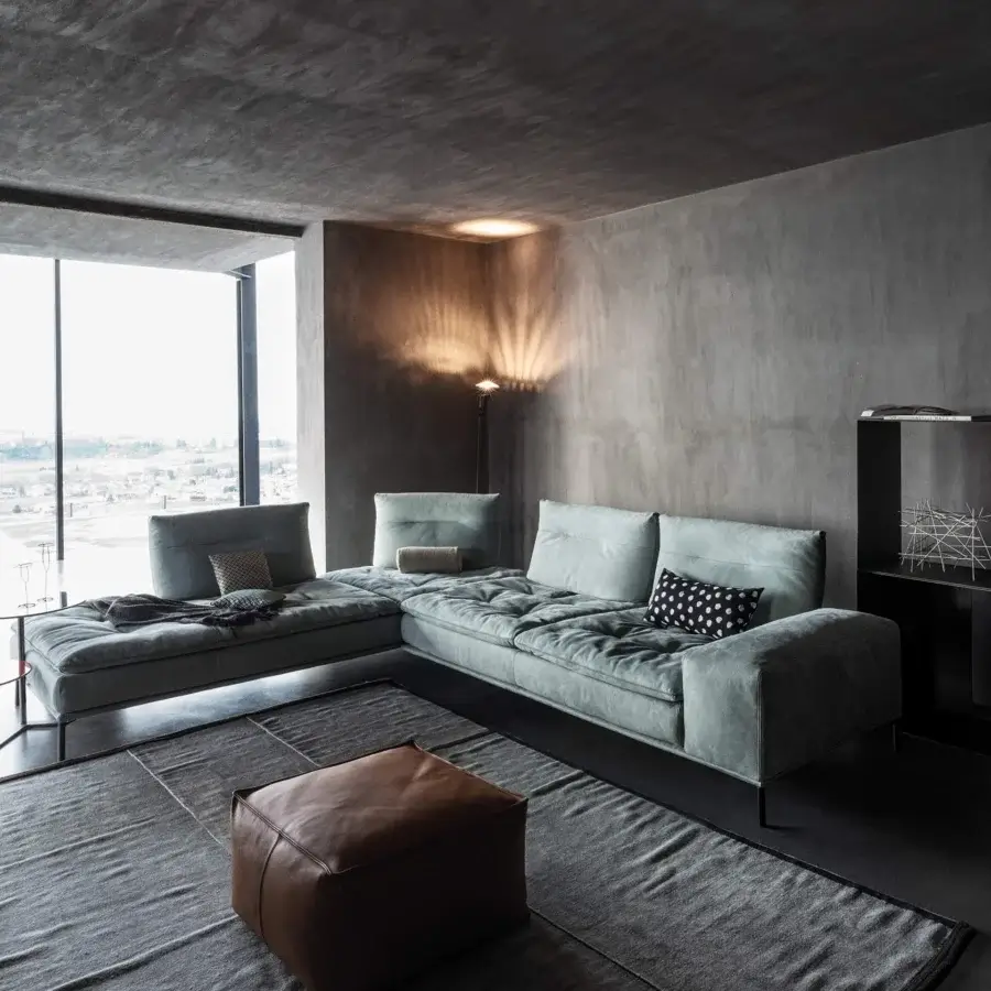 Innovative Cierre1972 Carlton sectional with muted grey-blue textile upholstery and adjustable backrest design