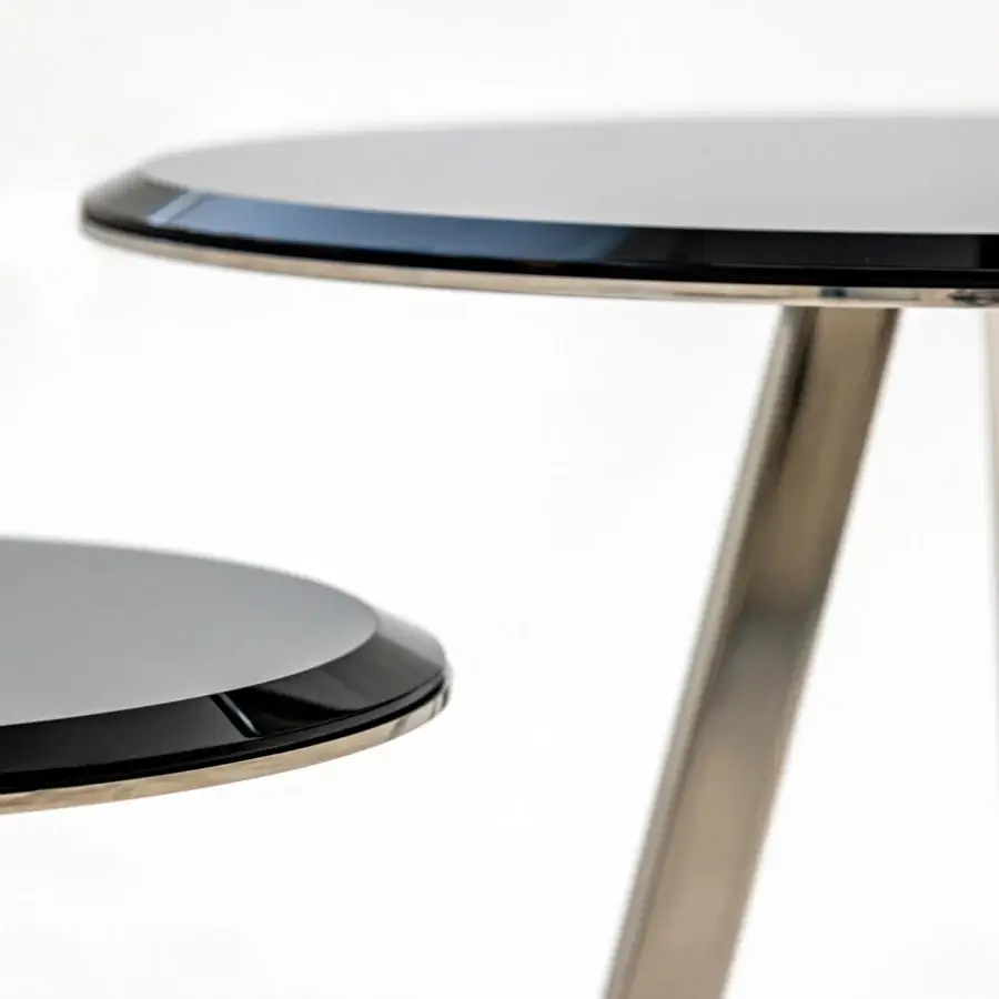 Elegant Casa Casati Mirage side table with black-edged composite tabletop and satin metal leg showcasing Italian craftsmanship