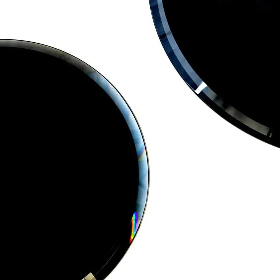 Refined Casa Casati Mirage side table with black nickel legs and mirrored conical-edged top in glossy black finish