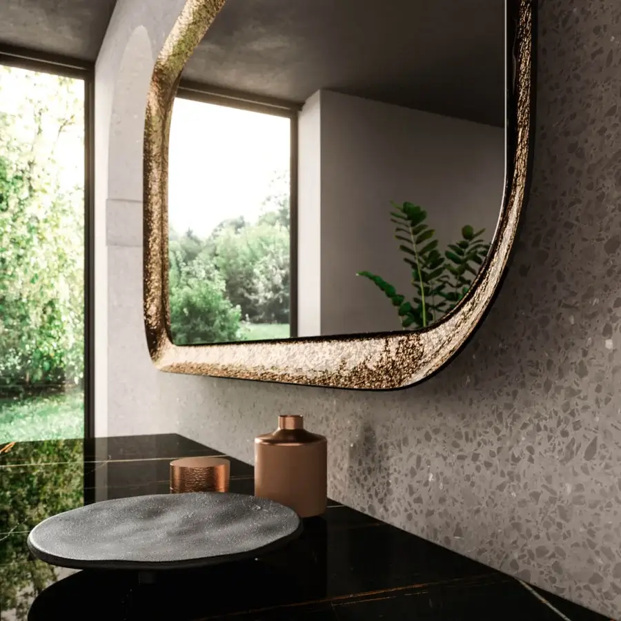 Distinguished Ozzio Italia Raggio mirror crafted with beveled etched glass in striking gold and black metallic tones with a textured finish