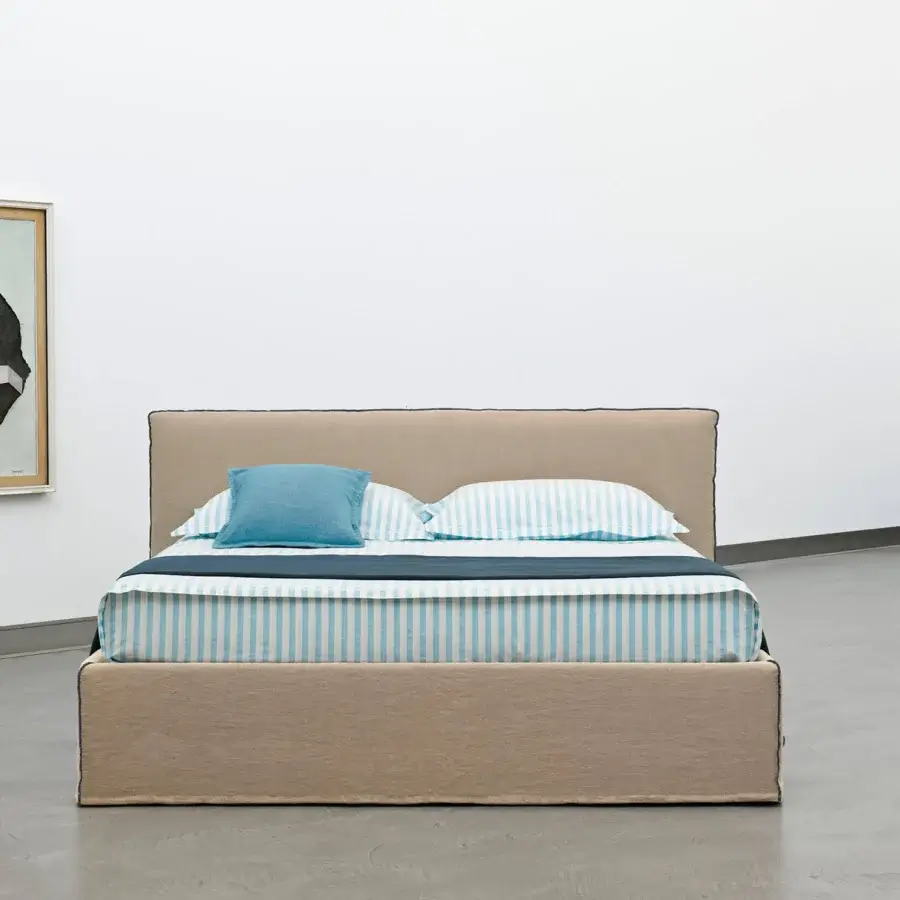 Captivating Horm Tahiti bed with light tan textile upholstery and mocha lacquered solid beechwood feet