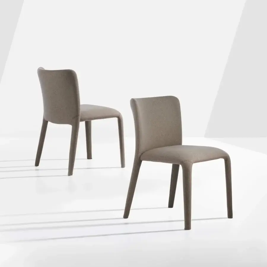 Distinguished Potocco Lars chair fully upholstered in high-end taupe fabric with a matte finish and integrated legs