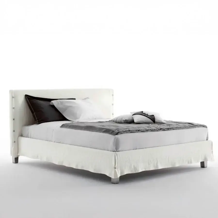 Exceptional Horm White bed with white textile upholstery, metal legs with a matte finish and stud detailing
