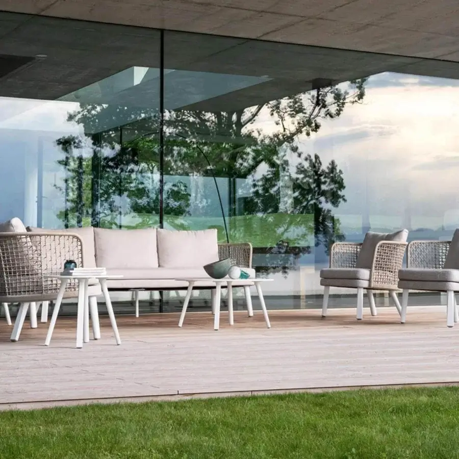 Elegant Varaschin Emma sofa with hand-woven aluminum frame and plush light beige cushions crafted in Italy