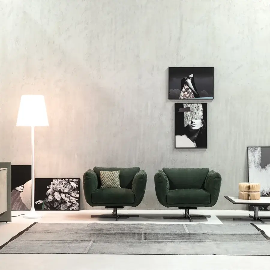 Distinguished Cierre1972 Amélie swivel lounge chair upholstered in dark green textile with matte finish