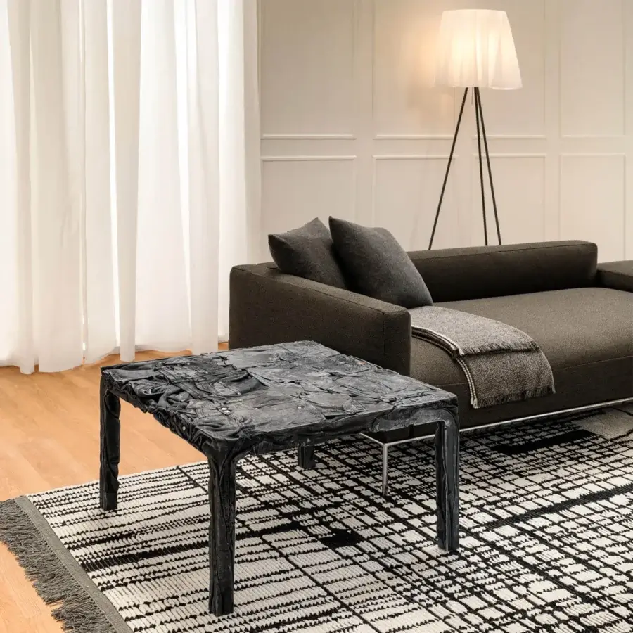 Elegant Horm Dizzy sofa with a light ecological aluminum frame clad in dark gray textile exhibiting a matte finish