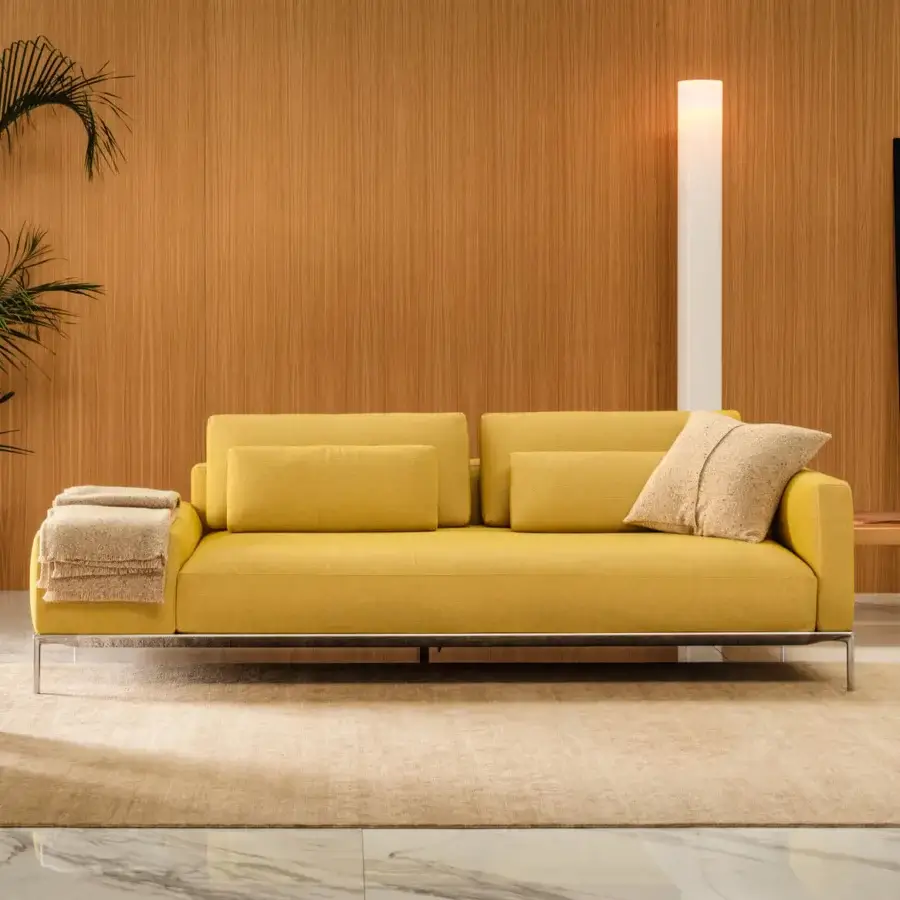 Distinguished Horm Dizzy sofa with a light ecological aluminum frame enveloped in uniform yellow textile crafted in Italy