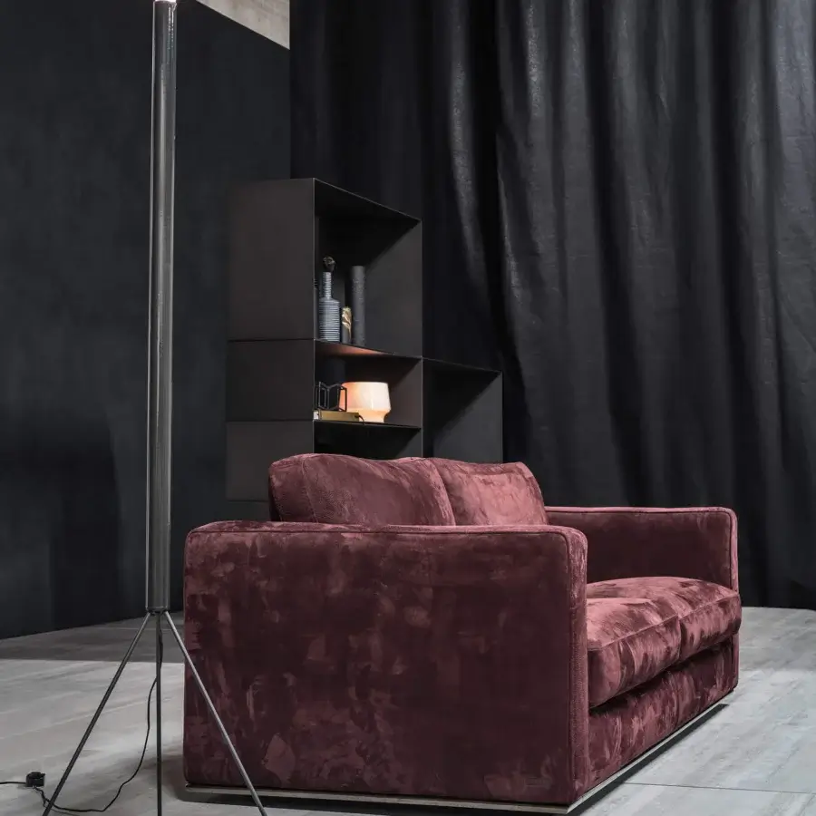 Distinguished Cierre1972 Dolce Vita small sofa upholstered in velvety burgundy textile with a sleek metal base
