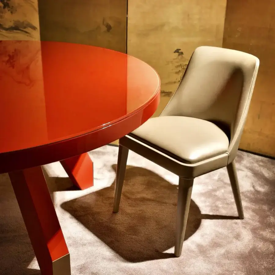 Distinguished Casa Casati Lola chair built with beech wood and light beige upholstery exhibiting refined piping detail