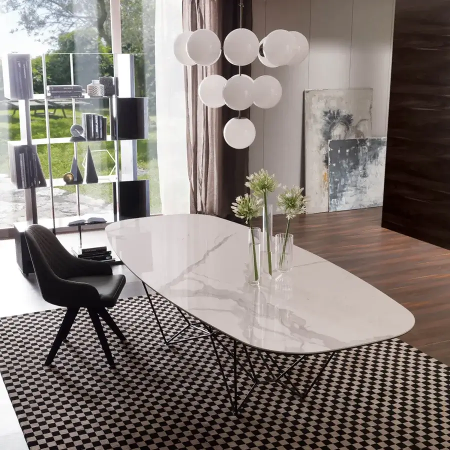 Elegant Ozzio Italia Fil8 table with interwoven black metal base and glossy marble-patterned glass top