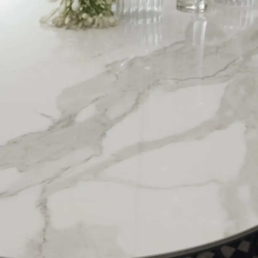 Distinctive Ozzio Italia Fil8 table with glossy Marble Glass top and refined metal rod base