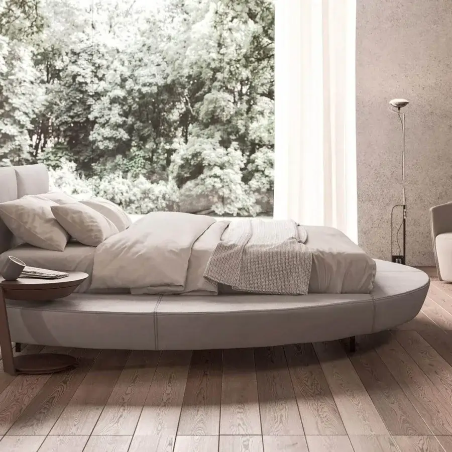 Innovative Presotto Zero bed with light gray textile upholstery and padded particleboard with solid pinewood base