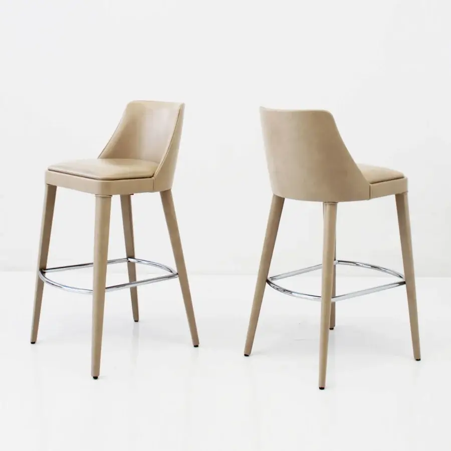 Exceptional Casa Casati Lola stool built with curving beech wood legs and light tan fabric upholstery with refined piping detail