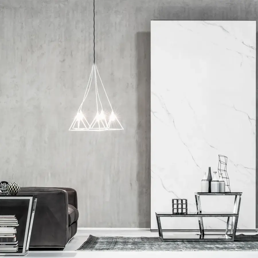 Superior Cierre1972 Dolce Vita sofa with dark textile upholstery, oblique cushions and a sleek metal base