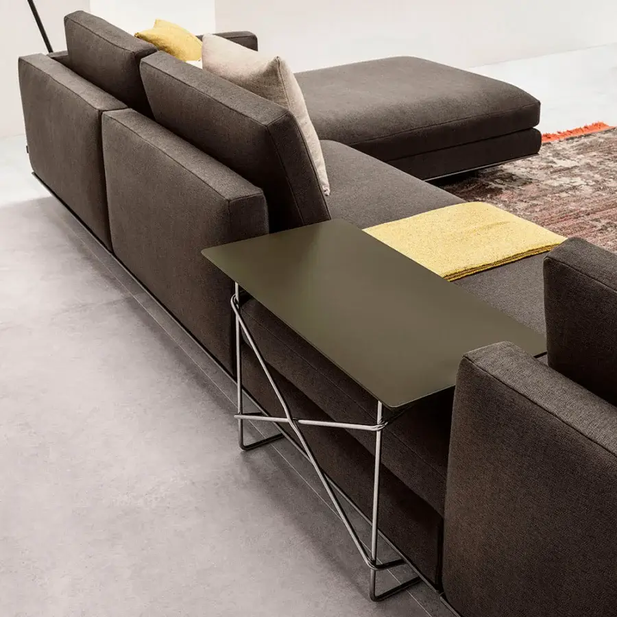 Superior Horm Miles sectional with an ecological aluminum frame enveloped in dark brown textile and matte finish