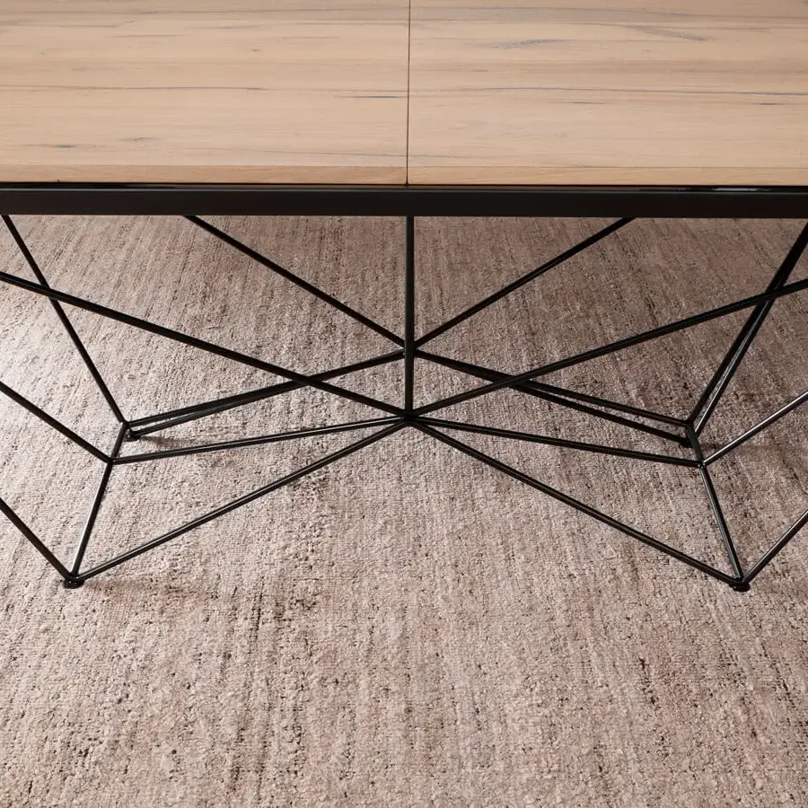 Exceptional Ozzio Italia Fil8 extendable table with a light wood top and striking black metal rods base crafted in Italy