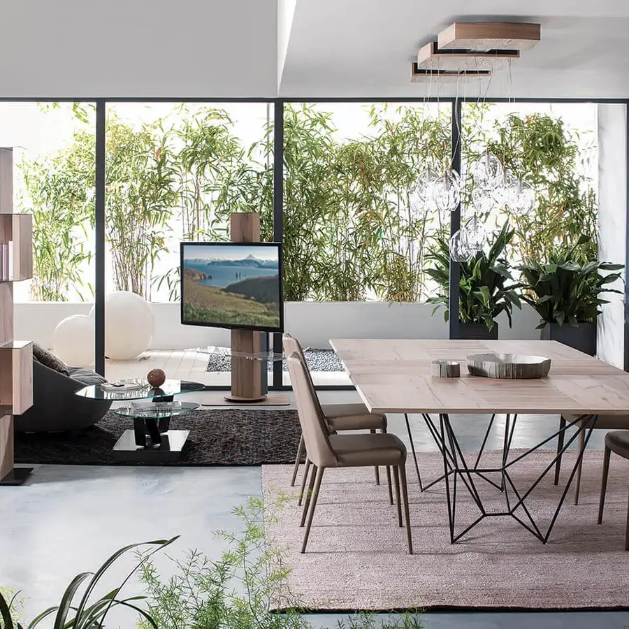 Exceptional Ozzio Italia Fil8 extendable table with a light brown wood top and geometric black metal base in a matte finish