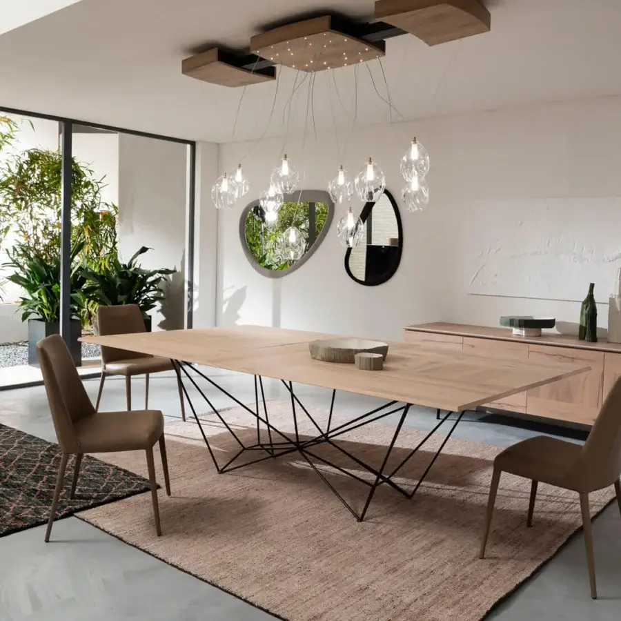 Superior Ozzio Italia Fil8 extendable table crafted with light wood and a matte finish, built with a dark metal geometric base