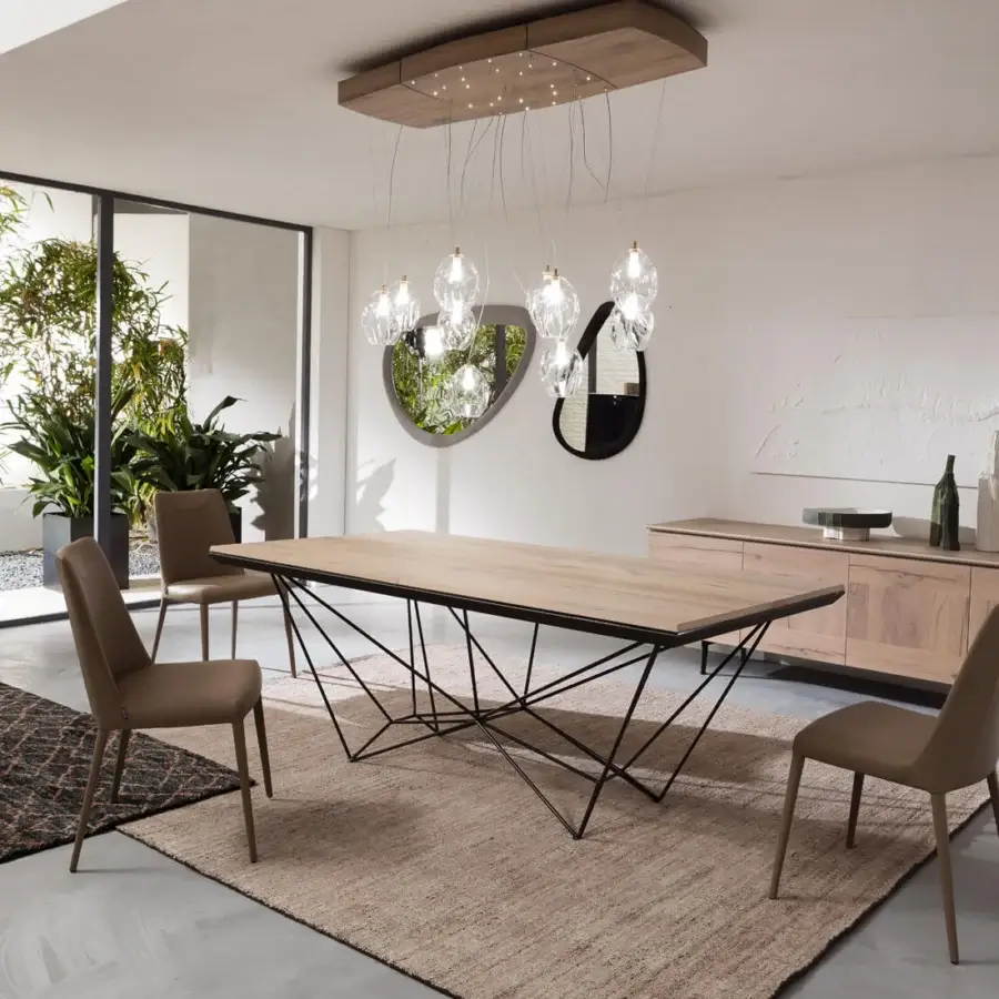 Distinguished Ozzio Italia Fil8 extendable table with a light wood tabletop and black metal geometric base in a matte finish