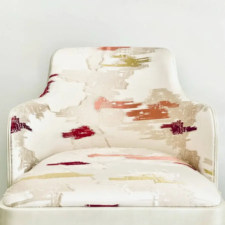 Exceptional Casa Casati Lola Royale chair built with beech wood and upholstered in leather displaying an abstract off-white pattern with burgundy accents
