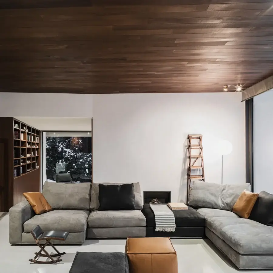 Superior Cierre1972 Dolce Vita sectional in muted gray textile with a sleek metal base and black tan pillows