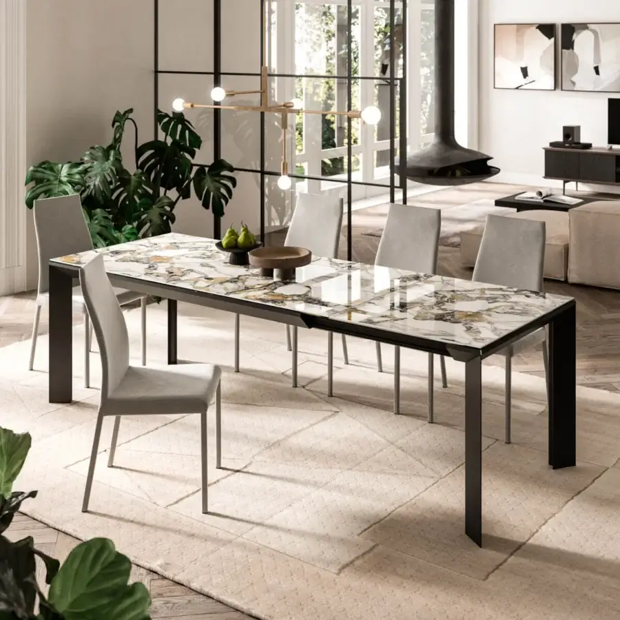 Distinguished Ozzio Italia Metrò table with laminated ceramic glass exhibiting faux marble in glossy white, grey, and gold tones with an extruded aluminum frame