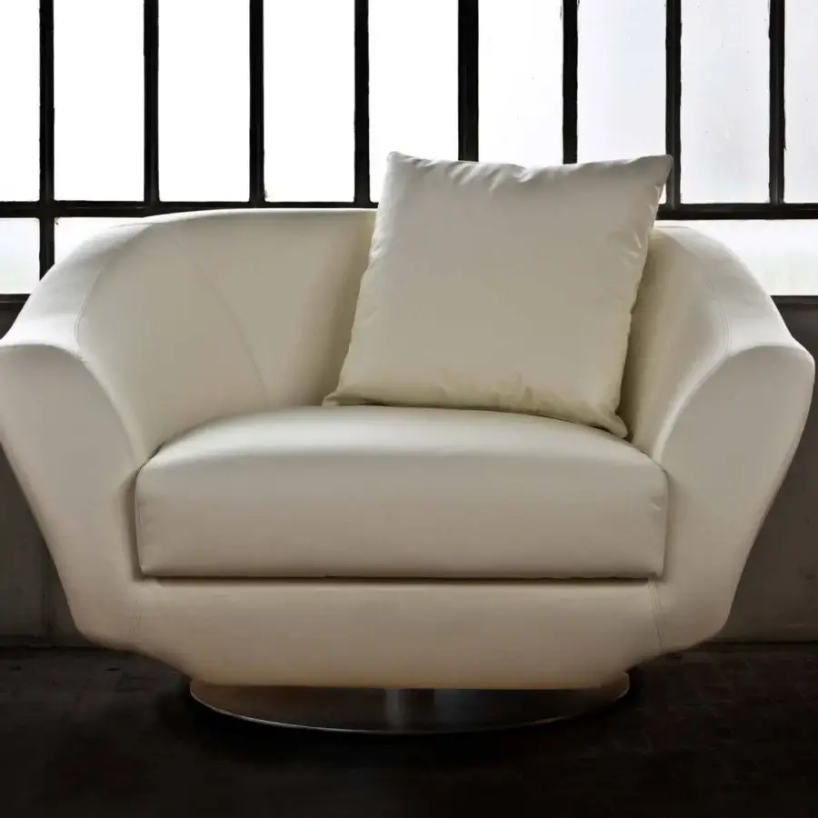 Exceptional Casa Casati Grande lounge chair with curved silhouette upholstered in light cream fabric and revolving gold chrome base