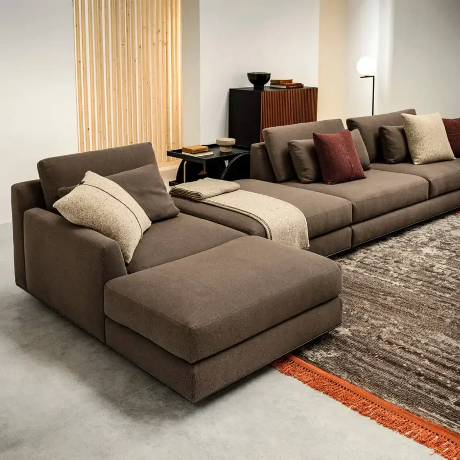 Exceptional Horm Ellington sectional with uniform brown textile upholstery and matte aluminum frame including back cushions
