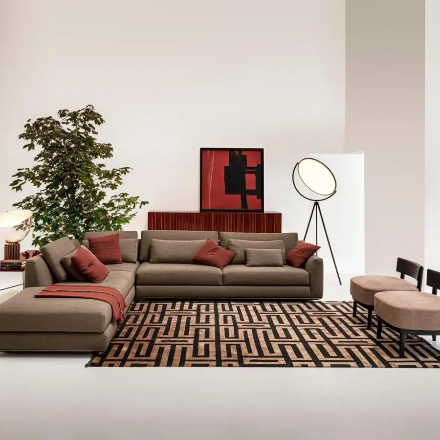Distinguished Horm Ellington sectional with ecological aluminum frame and soft brown upholstery, accented with reddish-brown cushions