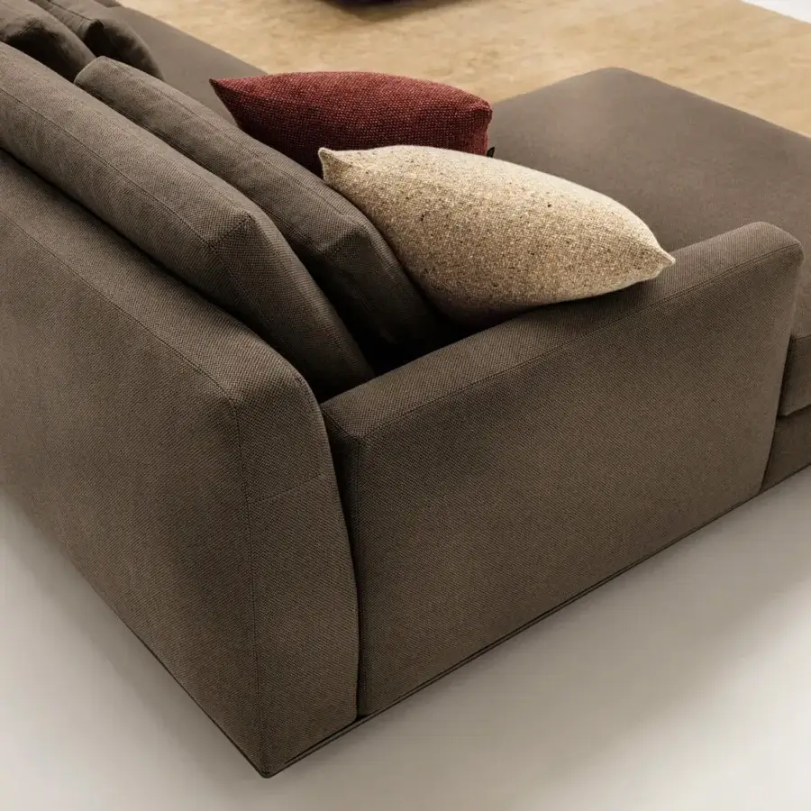 Elegant Horm Ellington sectional with aluminum frame upholstered in textured brown textile and included back cushions