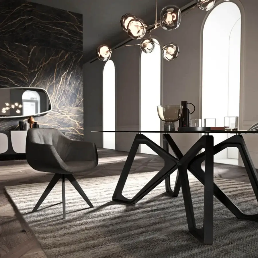 Elegant Ozzio Italia Papillon table with a sinuous dark matte base and clear glass top built with interconnected angular supports